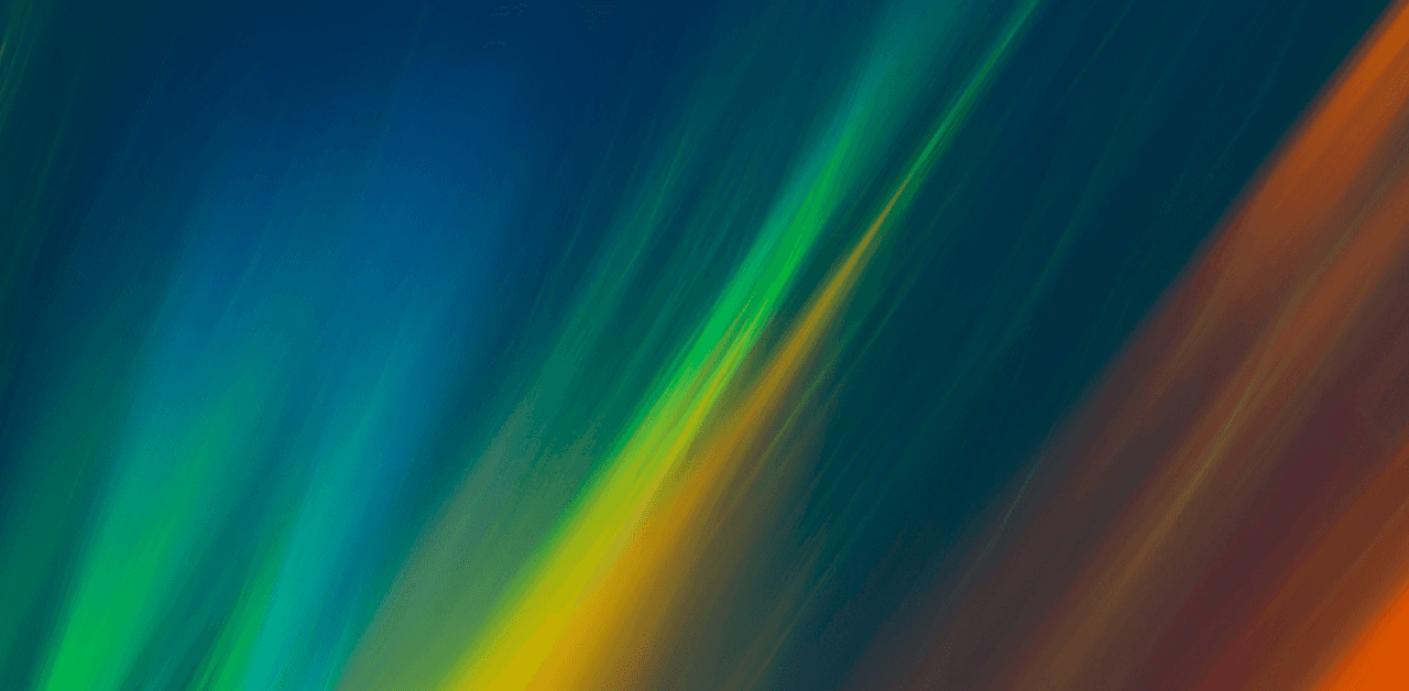 Abstract image with diagonal streaks of blue, green, yellow, and orange blending into each other.