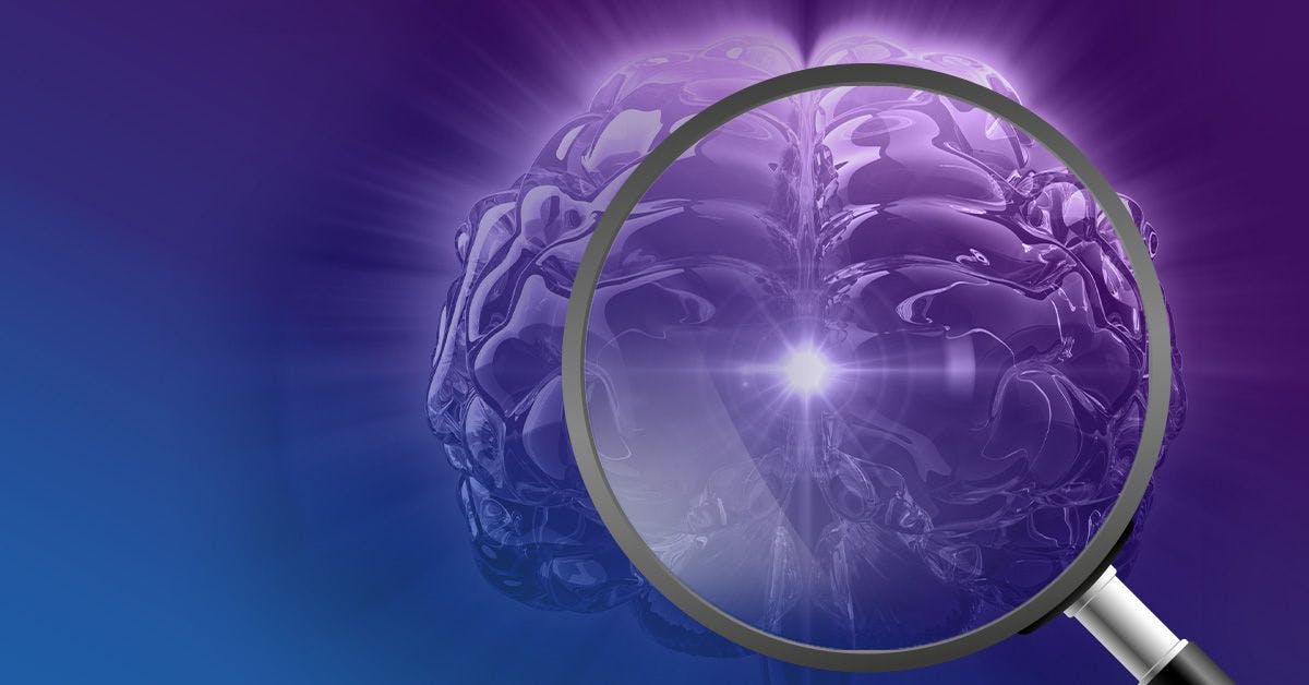Magnifying glass focusing on a glowing, purple brain against a gradient blue and purple background.