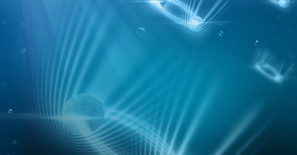 An image of a blue background with waves and bubbles.