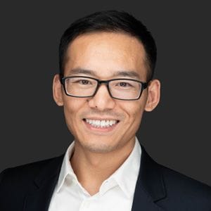 A headshot of Feng Tang