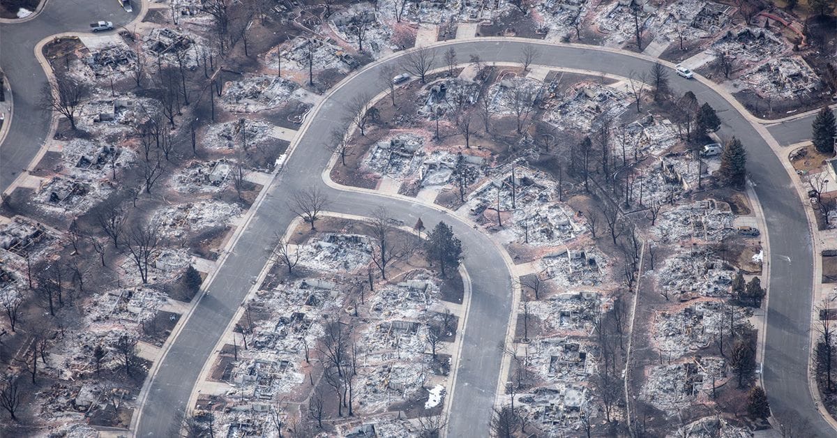 An aerial photograph of a burned neighborhood from Marshall wildfire, Louisville, Colorado 2021.