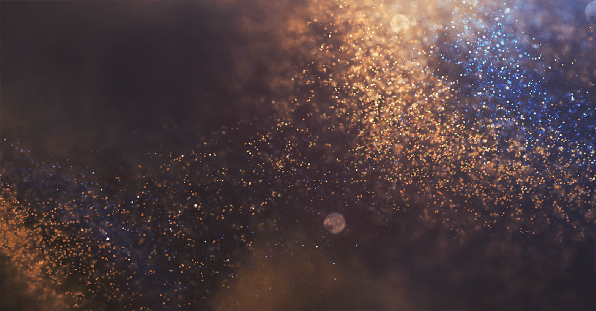 A dark background with a lot of sparkles in it.