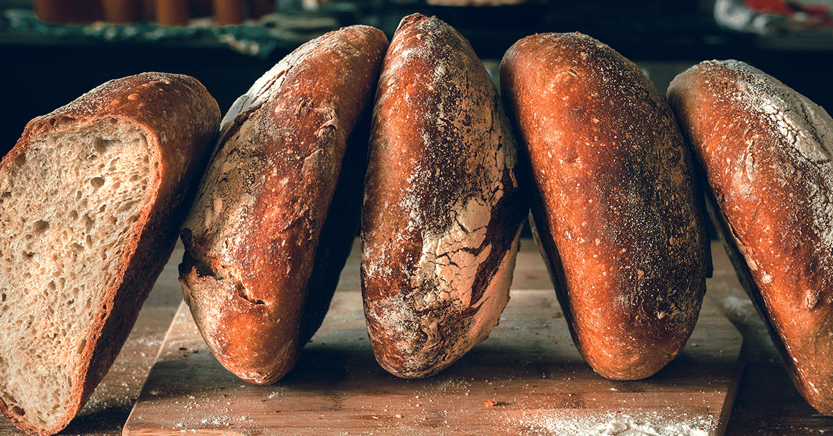 loaves of sourdough bread on a counter