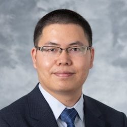 A headshot of Quanyin Hu