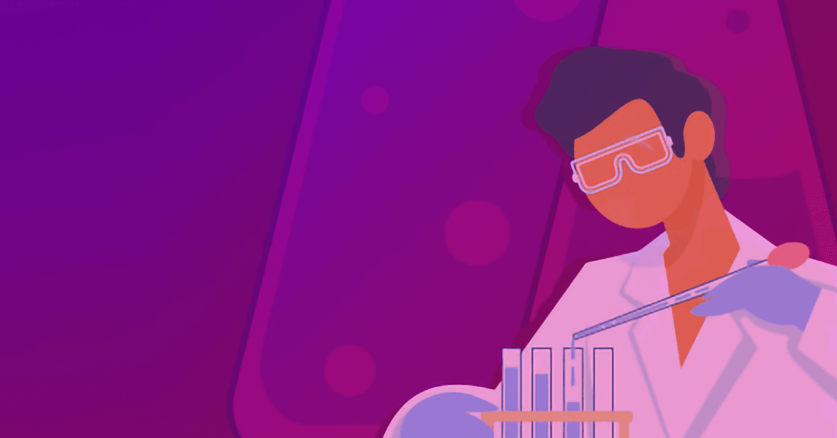 A scientist is holding a test tube.