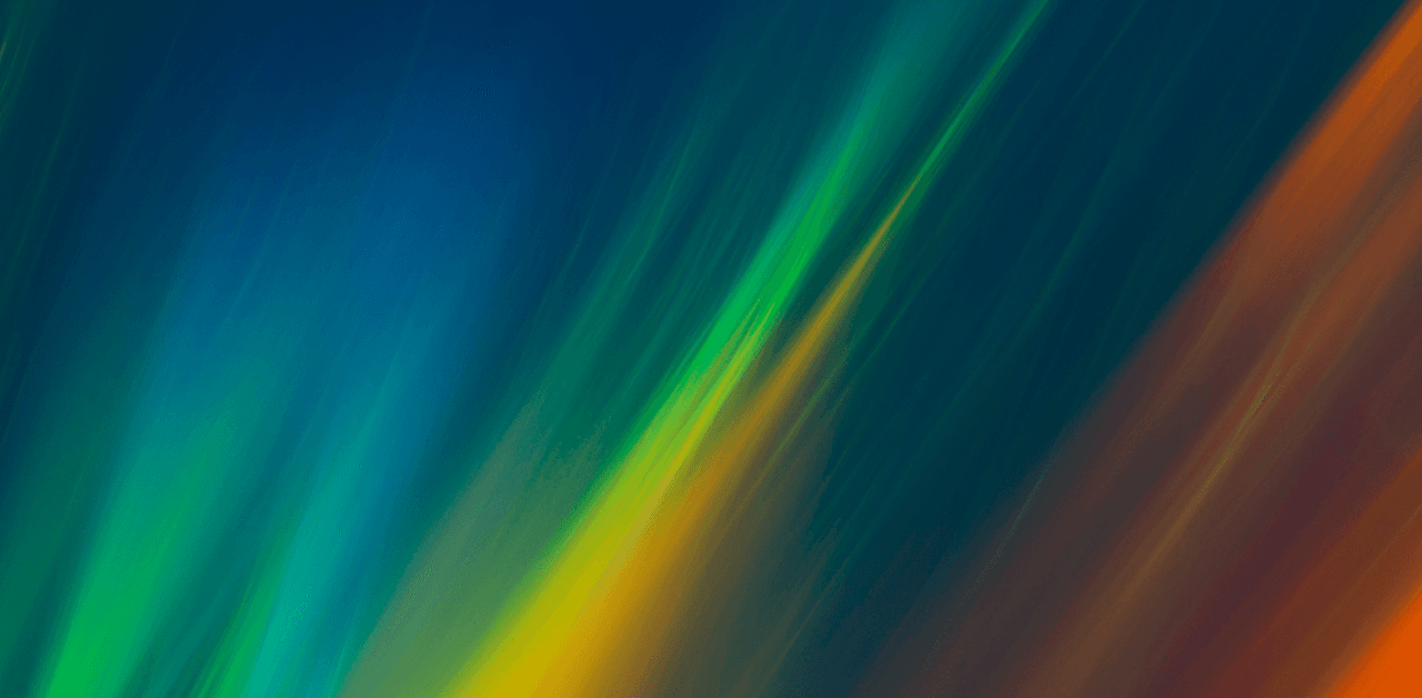 Abstract image with diagonal streaks of blue, green, yellow, and orange blending into each other.