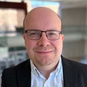 A headshot of Dr. Luke Erber