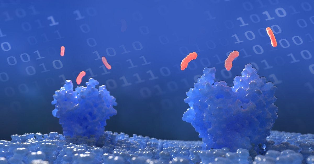 A group of blue cells in front of a computer screen.