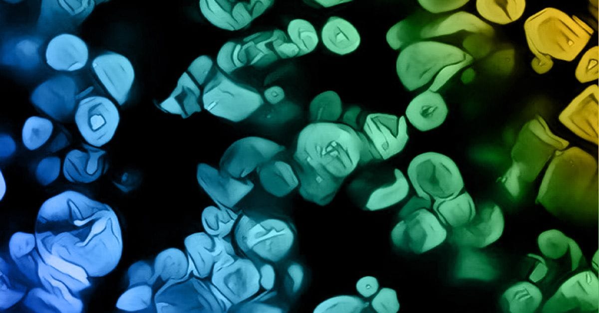 a close up of colorful lights on a black background.