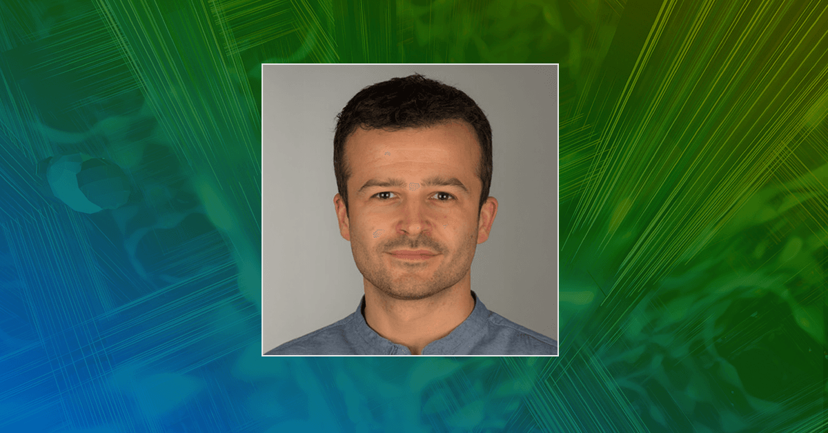 A headshot of Prof. Carlo Antonini on a blue and green background with abstract scientific and technical graphics.