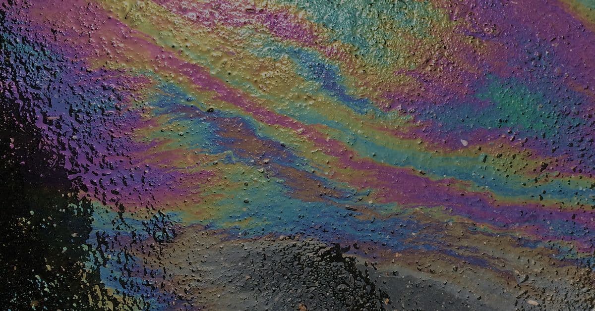 A colorful oil painting on a concrete wall.