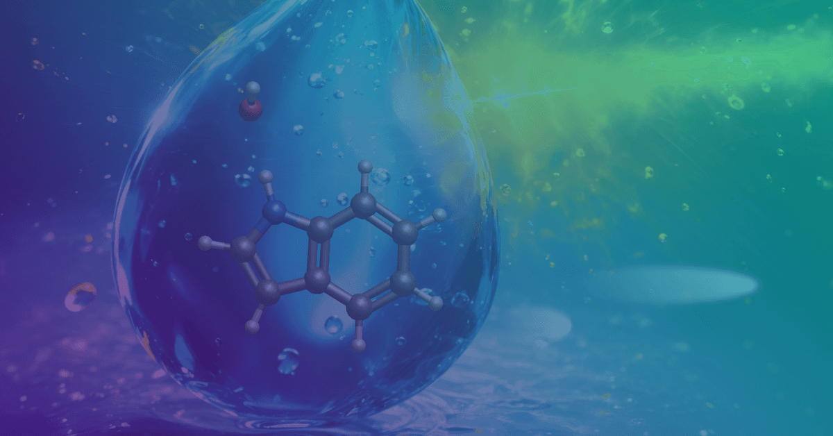 A blue water droplet encapsulates a molecular structure against a vibrant green and blue background, symbolizing chemistry and science.