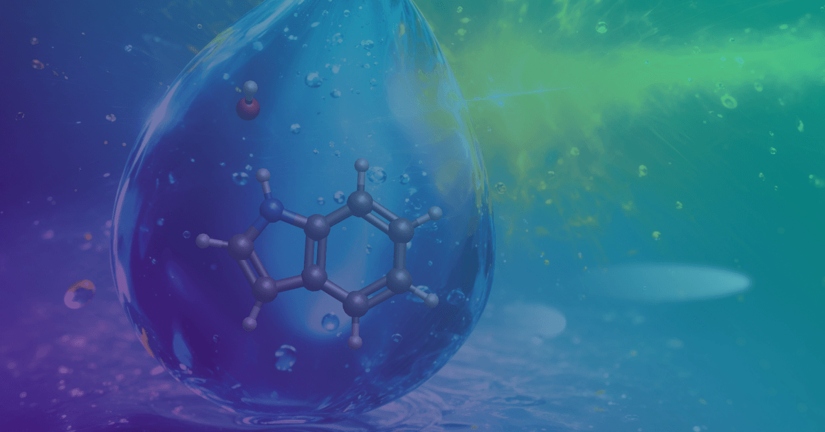 A blue water droplet encapsulates a molecular structure against a vibrant green and blue background, symbolizing chemistry and science.