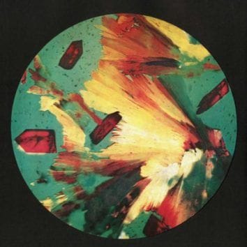 A photomicrograph showing pure red crystals of vitamin B12 (cobalamin). The isolation of vitamin B12 by researchers at Merck & Co., Inc., capped a two-decade long initiative to isolate, determine structures, and synthesize vitamins.Courtesy Merck.