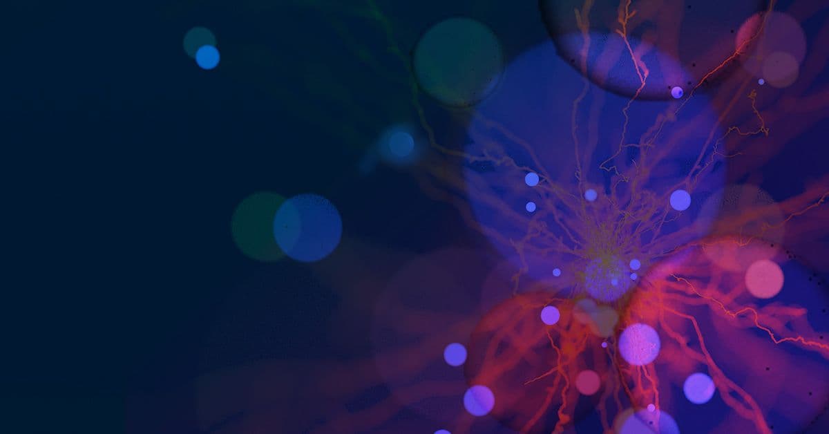 An abstract image of a blue background with red, blue, and purple dots.