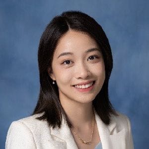 A headshot of Maggie Zheng