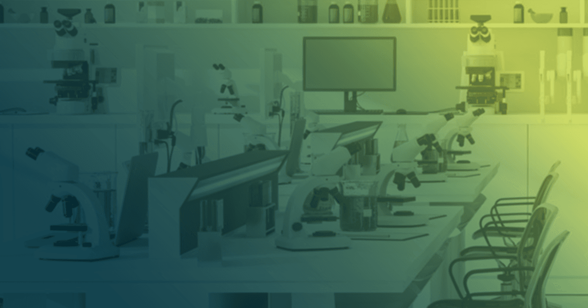 A graphic of a chemistry lab with microscopes and other countertop tools