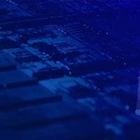 A blue background with a computer chip on it.