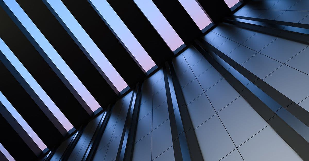 Abstract architectural image of a ceiling with vertical black beams and blue-tinted windows allowing natural light, casting shadows on the walls.