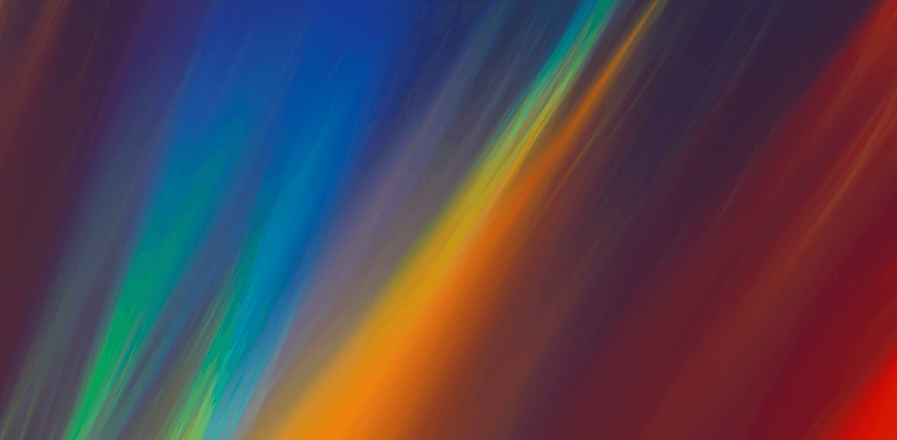Abstract image with diagonal streaks of blue, green, yellow, orange, and red blending together.
