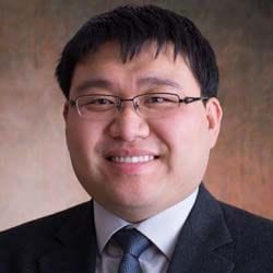 A headshot of Xiang Sun