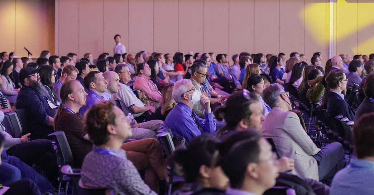 A crowd of attendees at ACS Fall 2024 listening to a keynote lecture