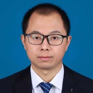 A headshot of Xiliang Yan