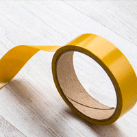A roll of double-sided sticky tape