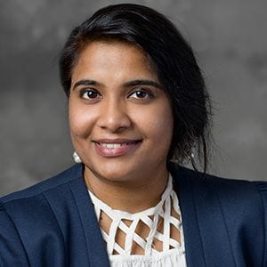 A headshot of Dr. Veda Krishnan