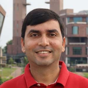 A headshot of Rukmankesh Mehra