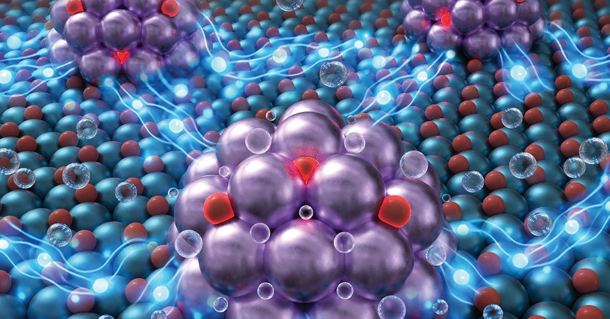 Abstract scientific illustration showing clusters of purple spherical particles embedded in a field of smaller blue spheres, with glowing lines and bubbles suggesting molecular interactions or energy transfer.