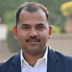 A headshot of Pradip Pachfule