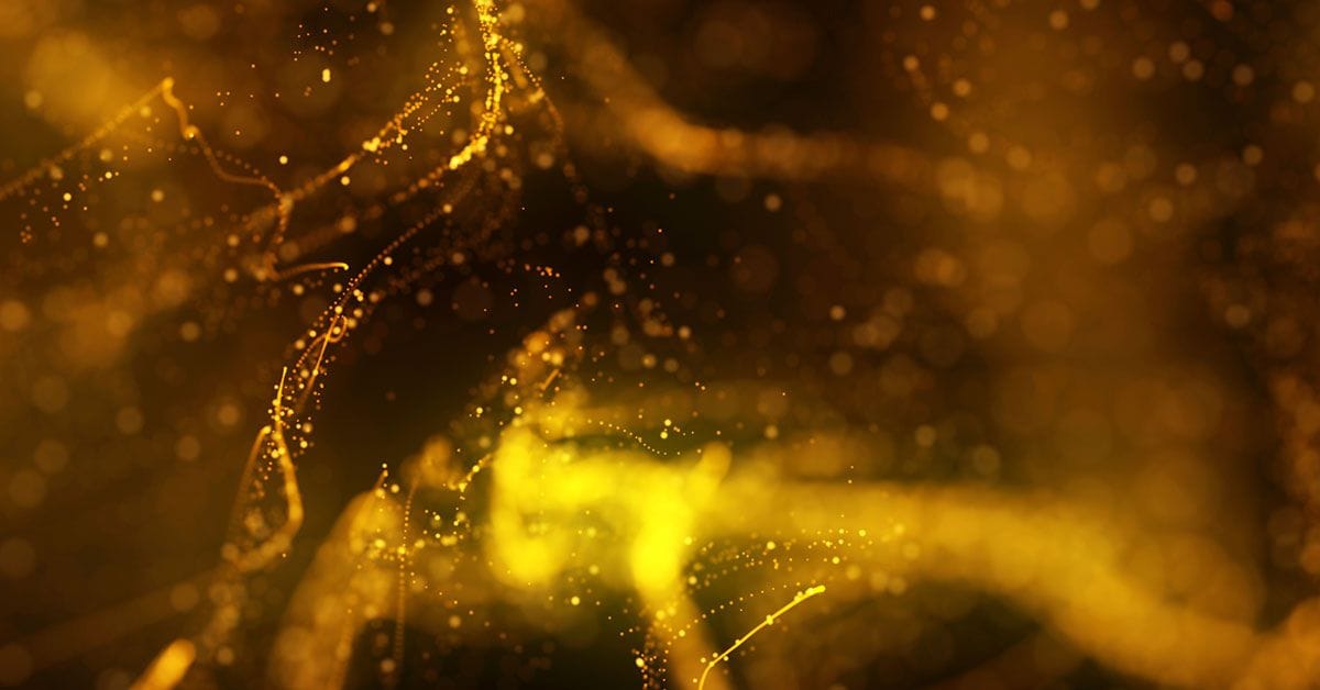 A close-up of flowing golden particles and shimmering lines against a dark background, creating a sense of depth and movement.