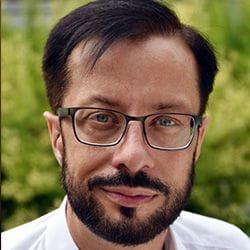 A headshot of Marek Sierka