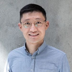 A headshot of Dr. Jianjun Cao