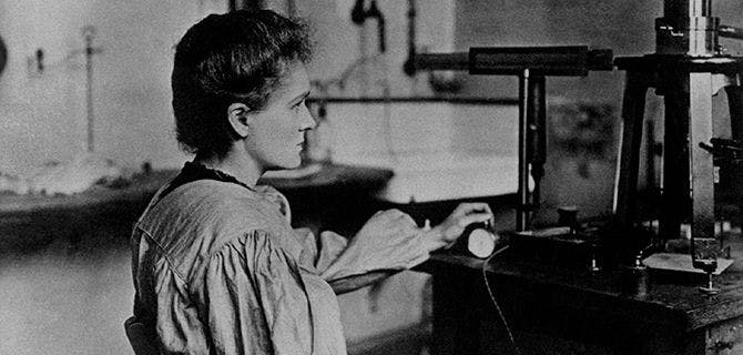 Women Scientists Honor Pioneers Like Marie Curie, shown here in her laboratory.
