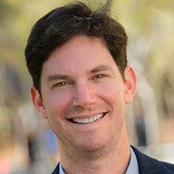 A headshot of Seth Cohen