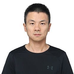 A headshot of Yi Wan