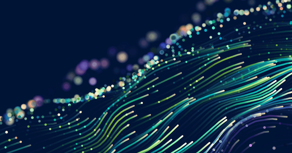 Abstract digital artwork featuring flowing multicolored lines and scattered glowing dots on a dark blue background, evoking motion and data streams.