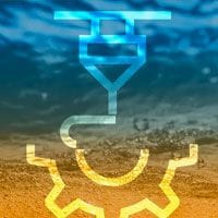 An illustration of a gear on the sand.