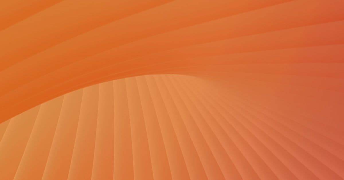 Abstract orange background with gradient and radial line pattern.