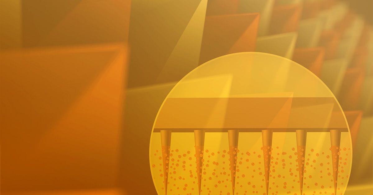 An image of a golden egg in front of a yellow background.