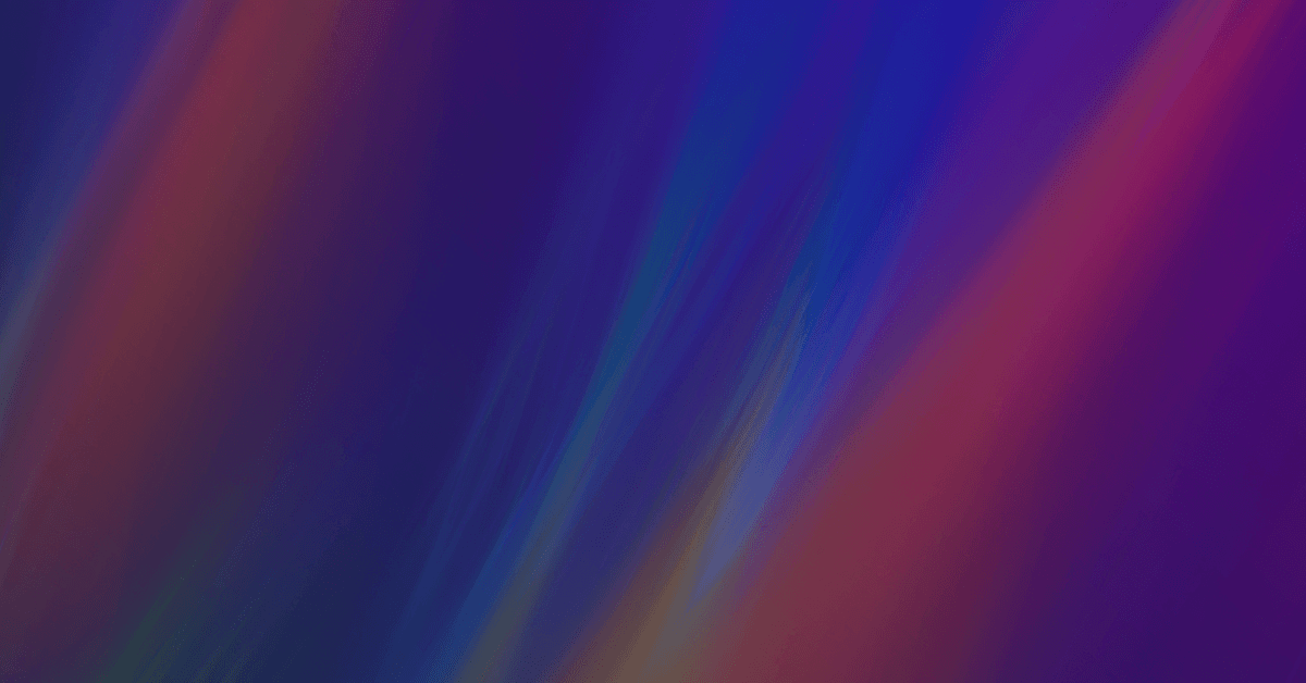 Diagonal streaks of blurred light in purple, blue, magenta, and orange across a dark background.