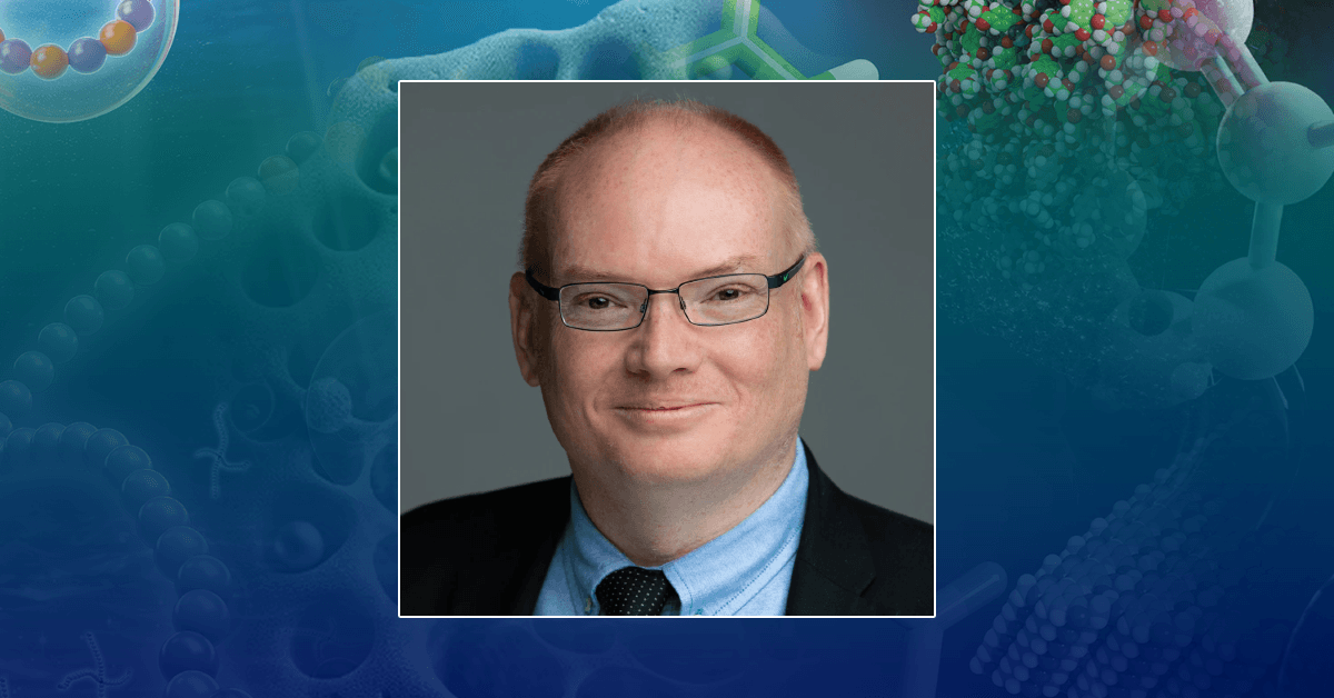 A headshot of Prof. Stuart J. Rowan over a blue scientific background featuring molecular and chemical imagery.
