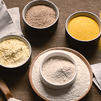 A selection of gluten-free flour alternatives in bowls