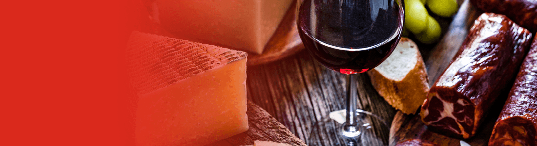 Red wine, meat, and cheese spread