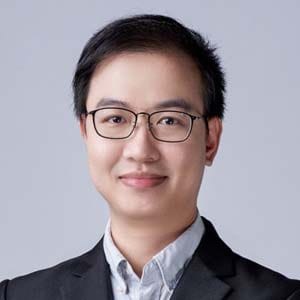 A headshot of Guomao Zheng