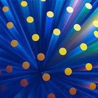 A blue background with yellow and blue dots.