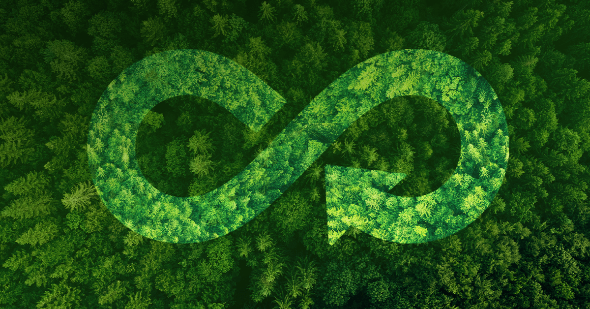 An aerial view of a lush green forest with an overlapping infinity symbol, symbolizing sustainability and ecological harmony.