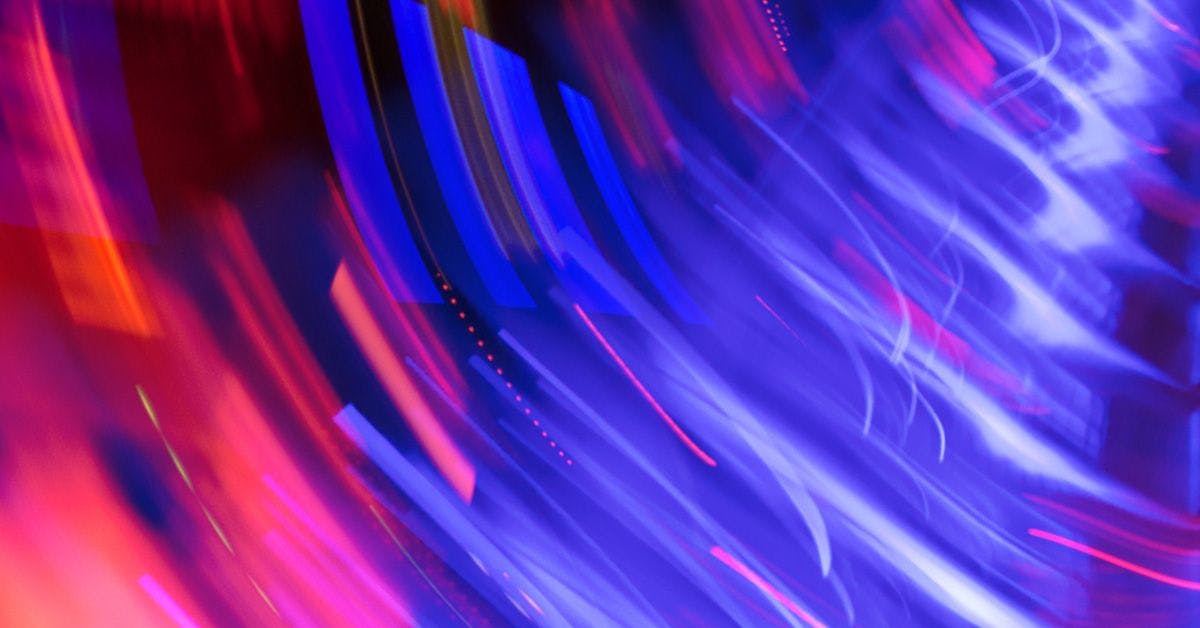 An abstract image of a blue and purple light.
